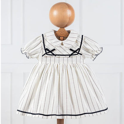 Robe bébé blanche a rayures noires